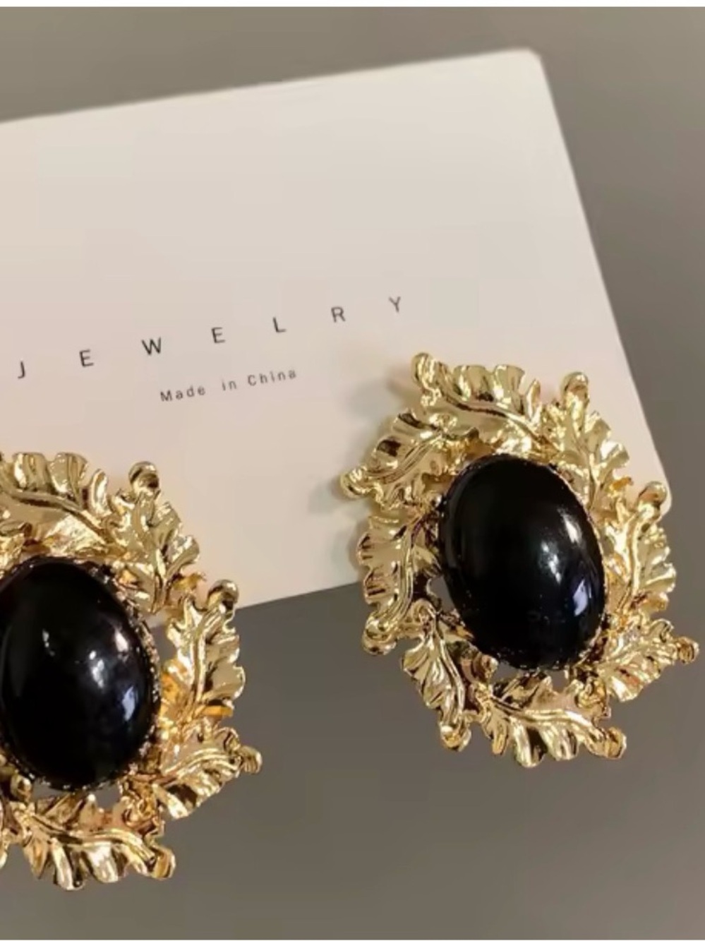 Gold Leaf Statement Earrings with Black Cabochon
